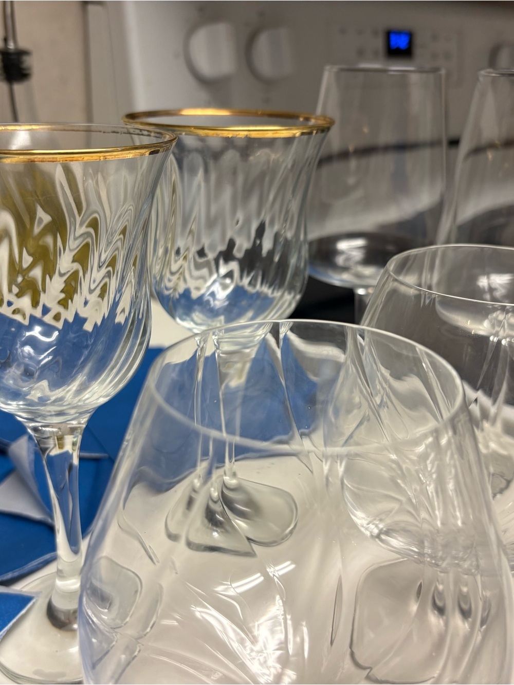 3 sets of two wine glasses + one singular holiday glass